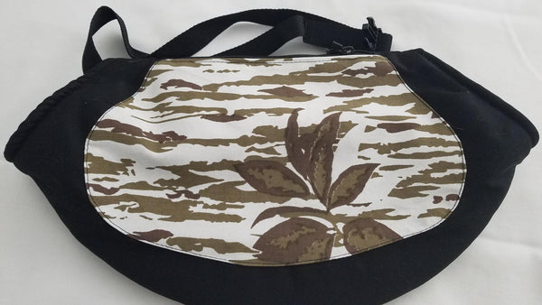 Snow Camo Fleece lined Hand warmer Muff has easy angled openings for the hands. The Hand Muff front zipper pocket can be used to store items or for added warmth by placing Heat Factory Warmers in it. Great way to keep your hands warm.