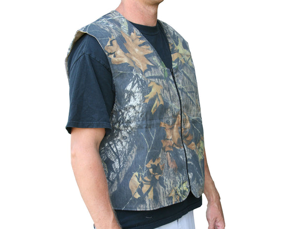 Mossy Oak Cool Vest is made of light weight cotton poly fabric with an adjustable  drawstring waist and a front zipper closure. Machine washable.  Freeze cool packs for 4 hours. Place cool packs into vest pockets (4-6 are usually enough). Put on vest and adjust the drawstring. Feel the coolness! Includes 6 Cold Packs.